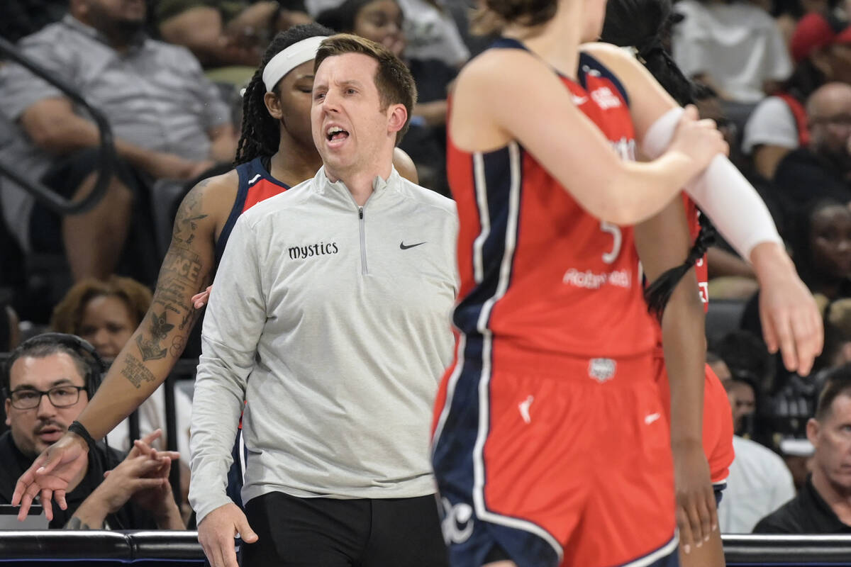 Washington Mystics head coach Eric Thibault directs his team against the Las Vegas Aces during ...