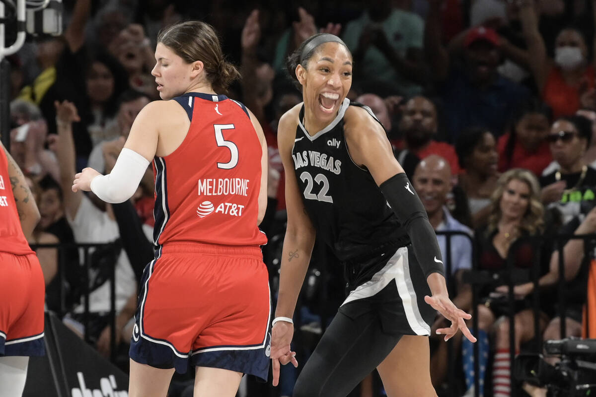 Las Vegas Aces center A'ja Wilson (22) celebrates a play against the Washington Mystics during ...