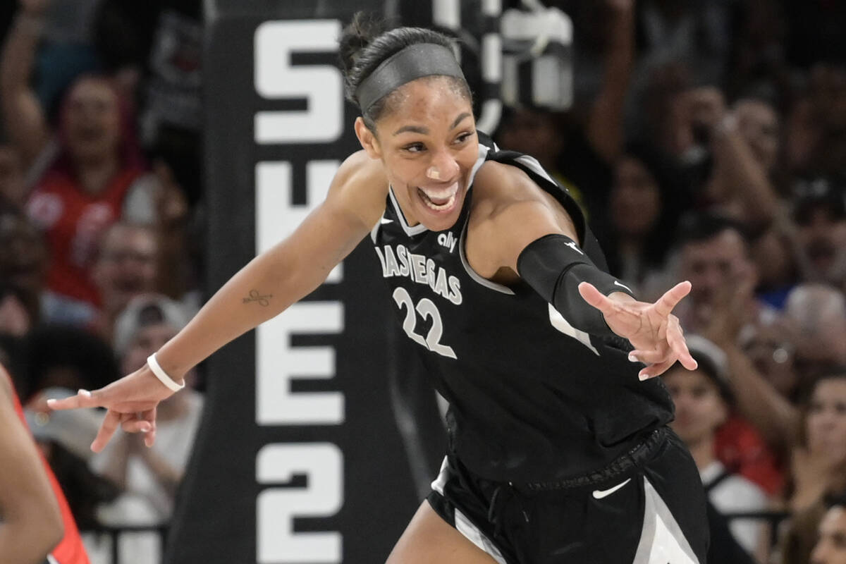 Las Vegas Aces center A'ja Wilson (22) celebrates a play against the Washington Mystics during ...