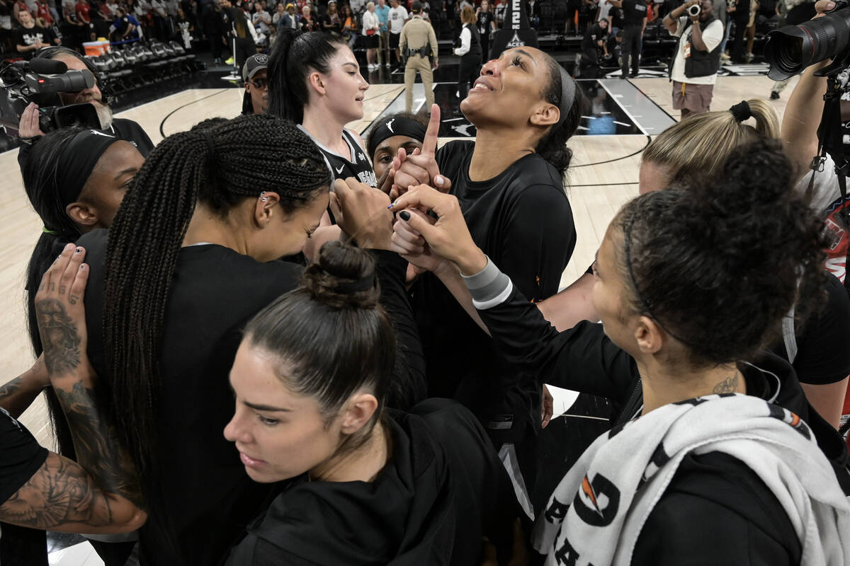 The Las Vegas Aces huddle after their WNBA game against the Washington Mystics Thursday, July 4 ...