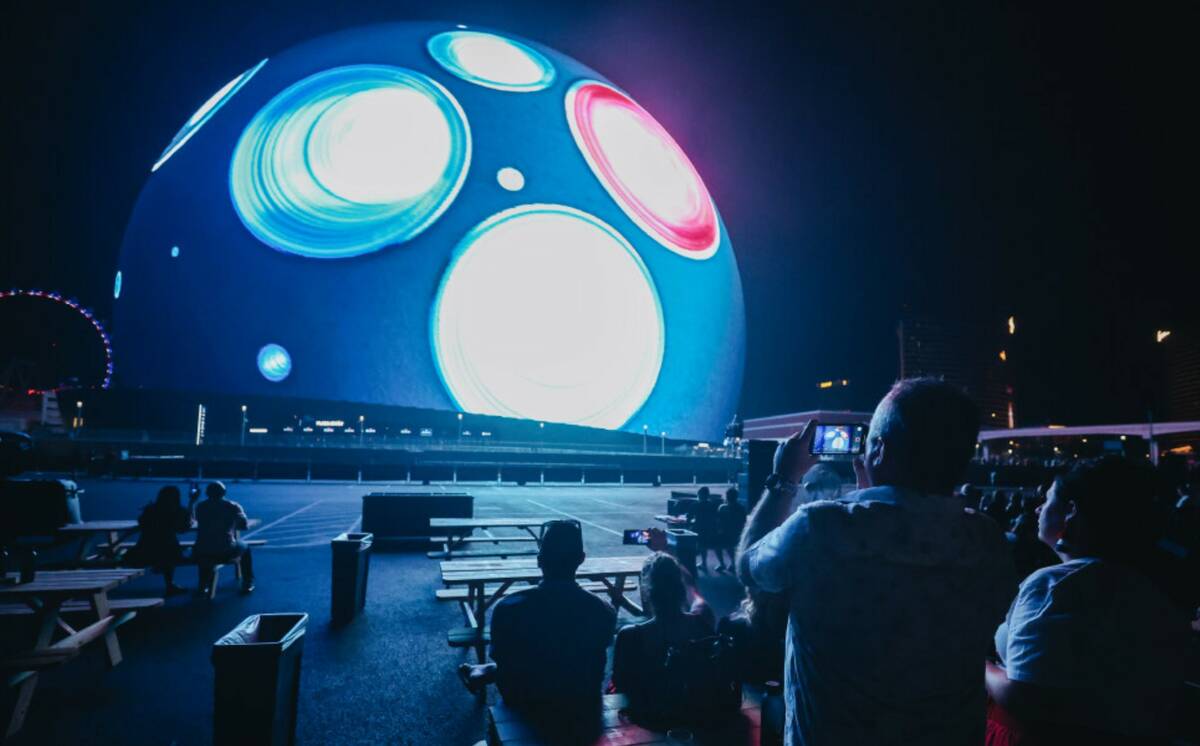 Spectators film at the Sphere on Thursday, July 4, 2024, in Las Vegas. (Madeline Carter/Las Veg ...