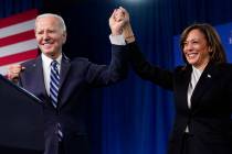 President Joe Biden and Vice President Kamala Harris stand on stage at the Democratic National ...