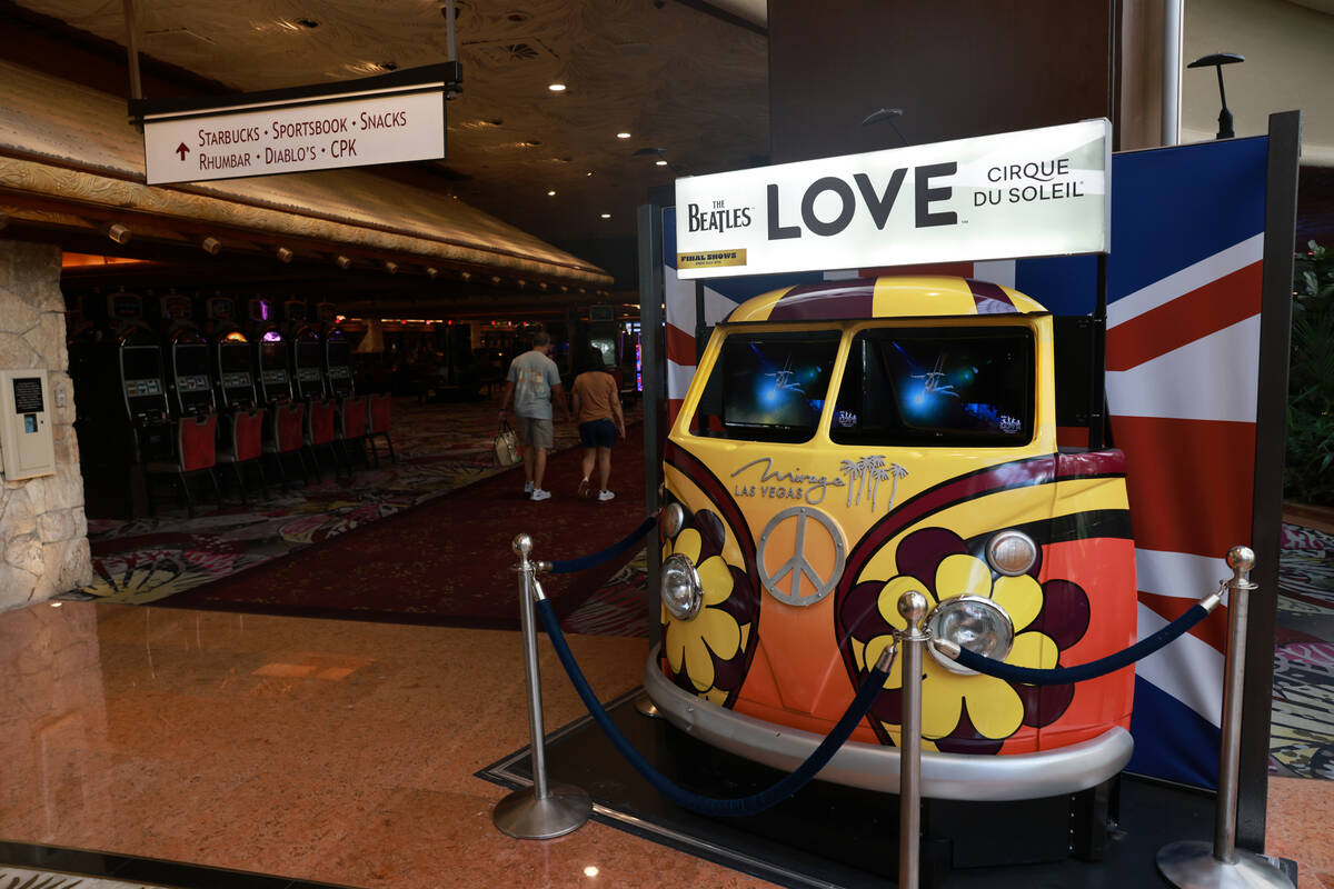 Guest walk past dark machines at The Mirage on the Strip in Las Vegas Friday, July 5, 2024. The ...