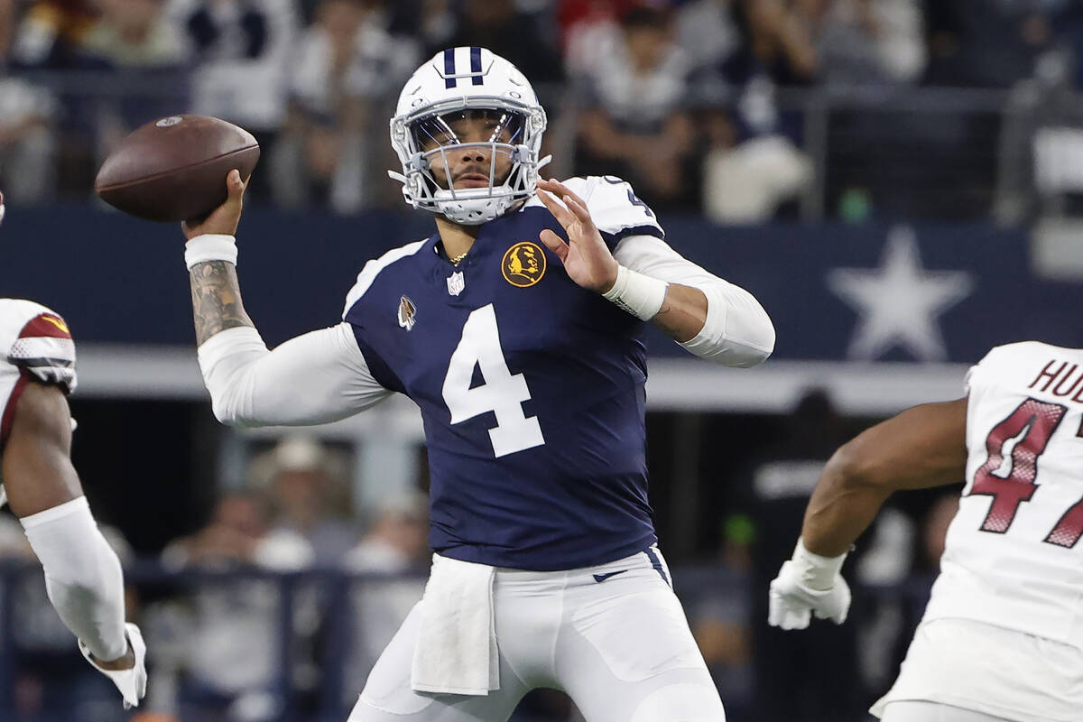 Dallas Cowboys quarterback Dak Prescott (4) passes against the Washington Commanders during the ...