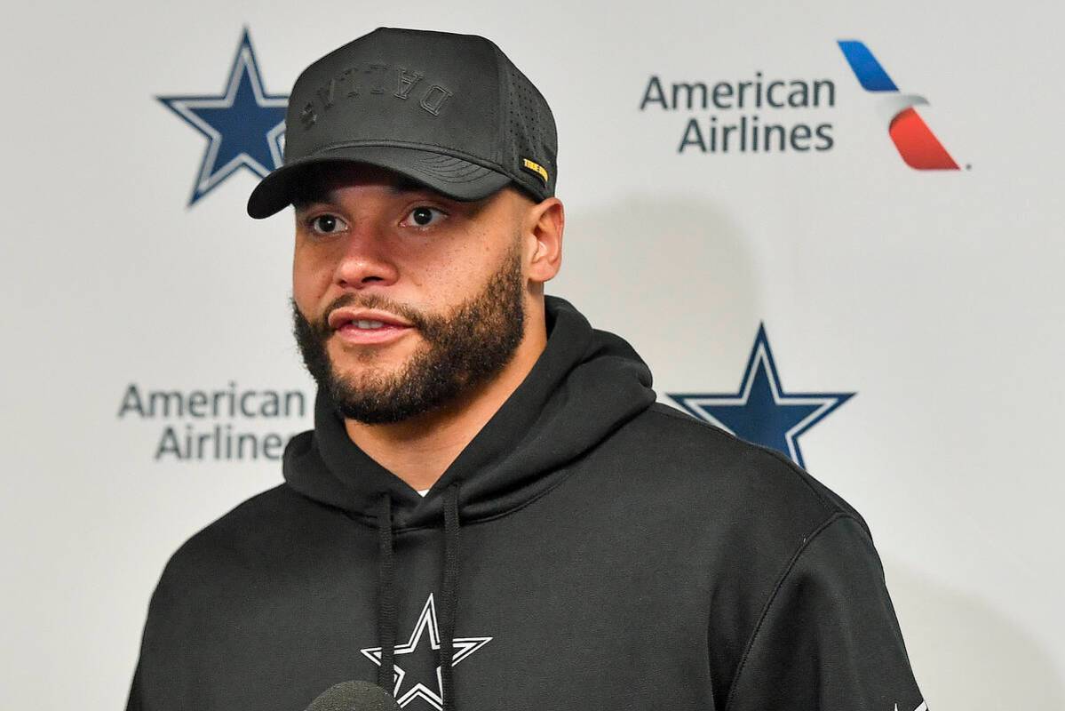 Dallas Cowboys quarterback Dak Prescott (4) answers questions during a news conference after pl ...