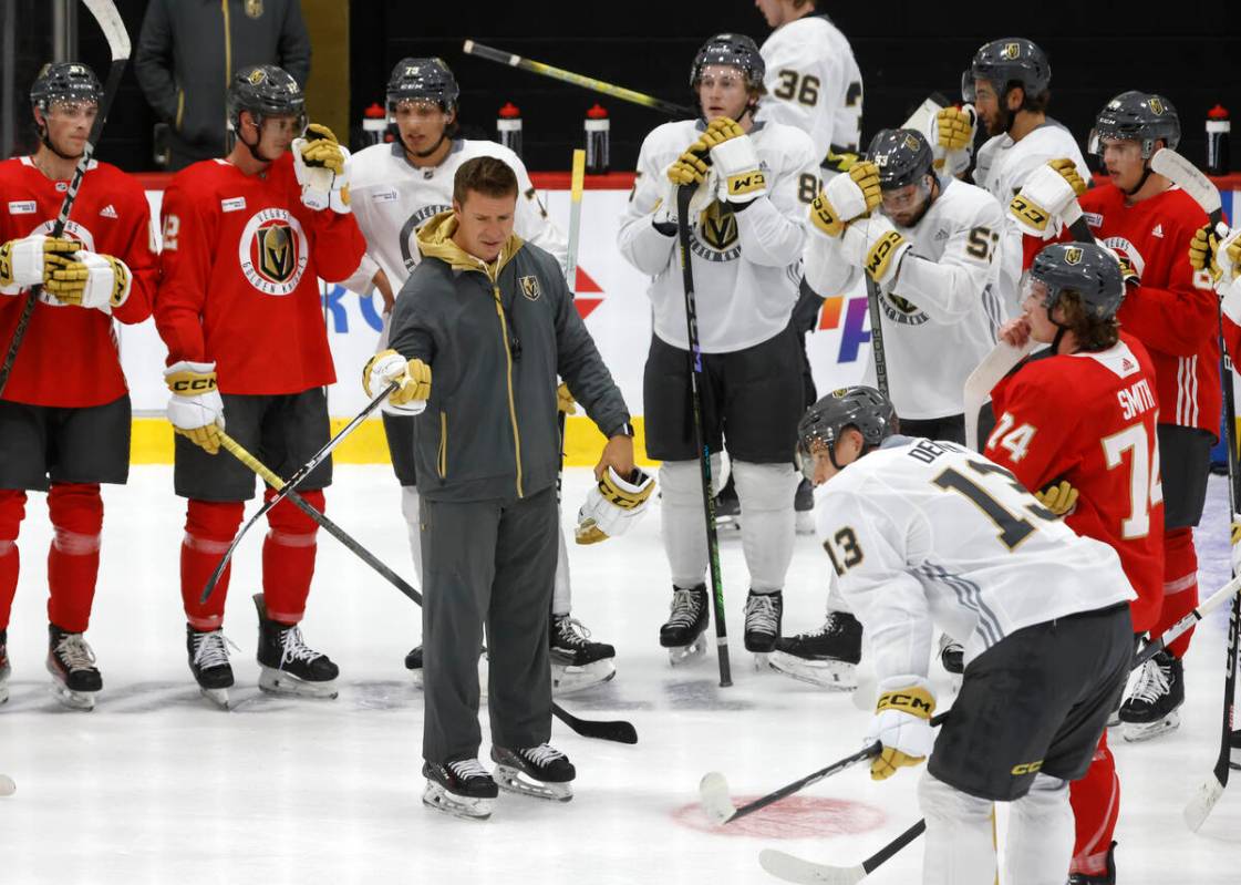 Silver Knights head coach Ryan Craig speaks to players during Golden Knights development camp ...