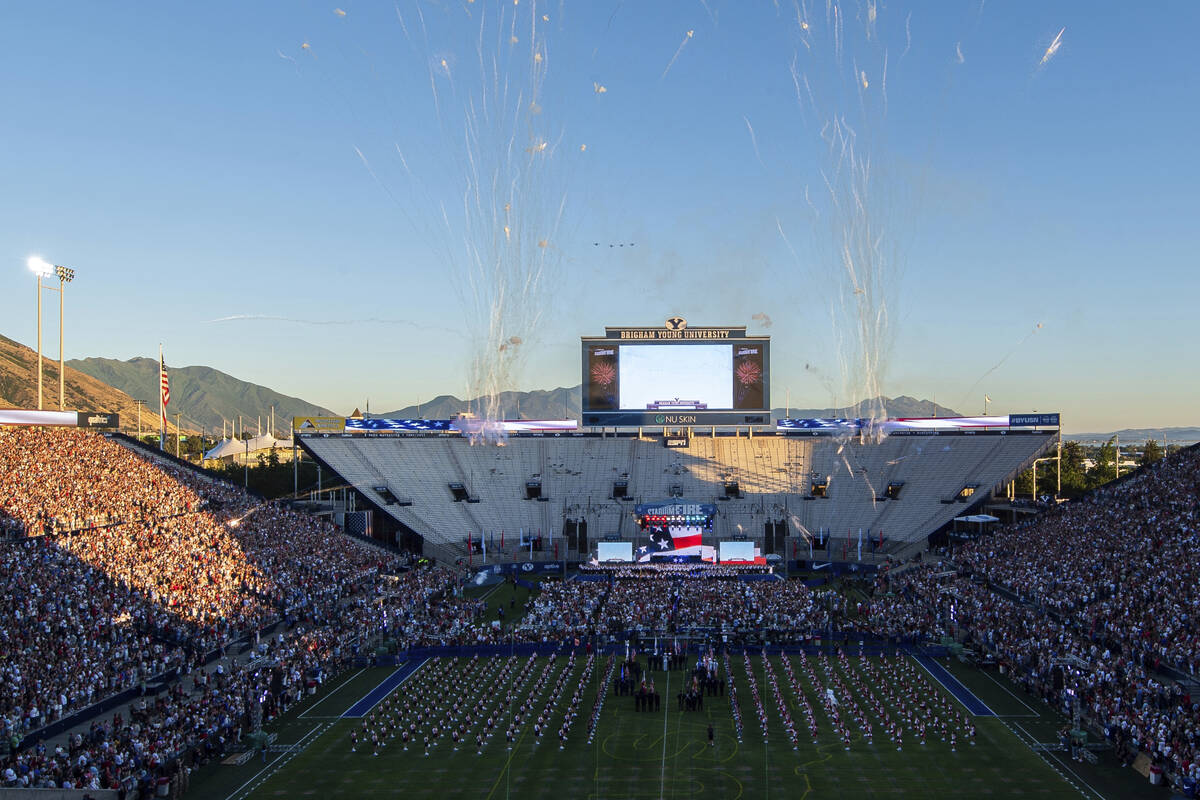 Fireworks explode in the sky during a July Fourth celebration at LaVell Edwards Stadium, Thursd ...