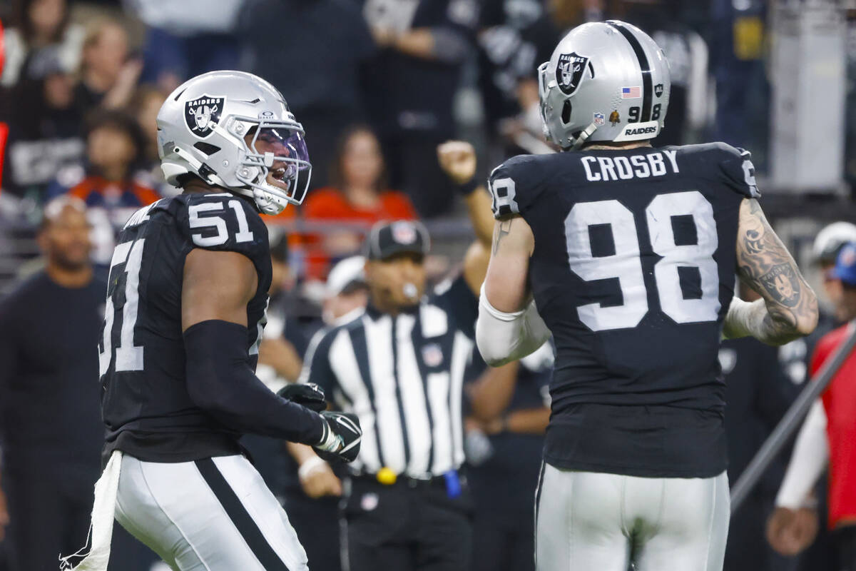 Raiders defensive end Malcolm Koonce (51) reacts after sacking Denver Broncos quarterback Jarre ...