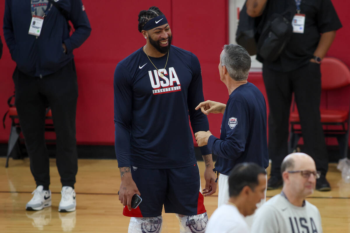 Los Angeles Lakers forward Anthony Davis chats on the court during training camp for the USA Ba ...