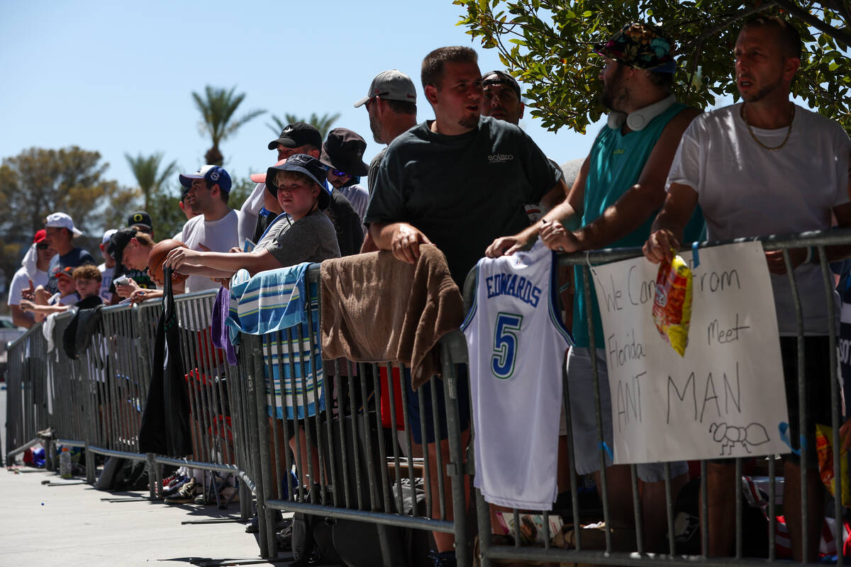 Fans brave high temperatures to wait for autographs from the USA Basketball Men’s Nation ...