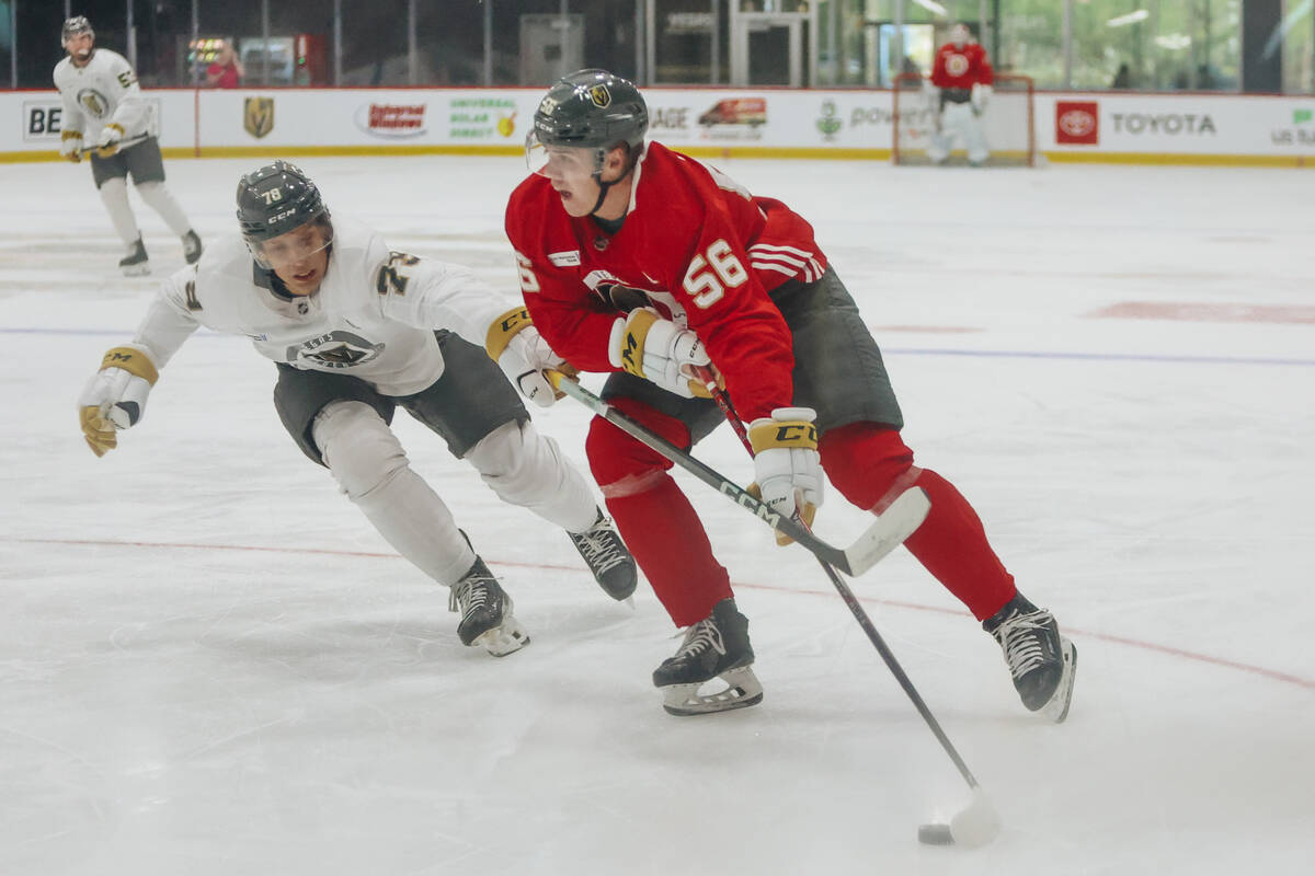 Golden Knights development camp forward Tyler Kopff (56) skates the puck down the ice during a ...