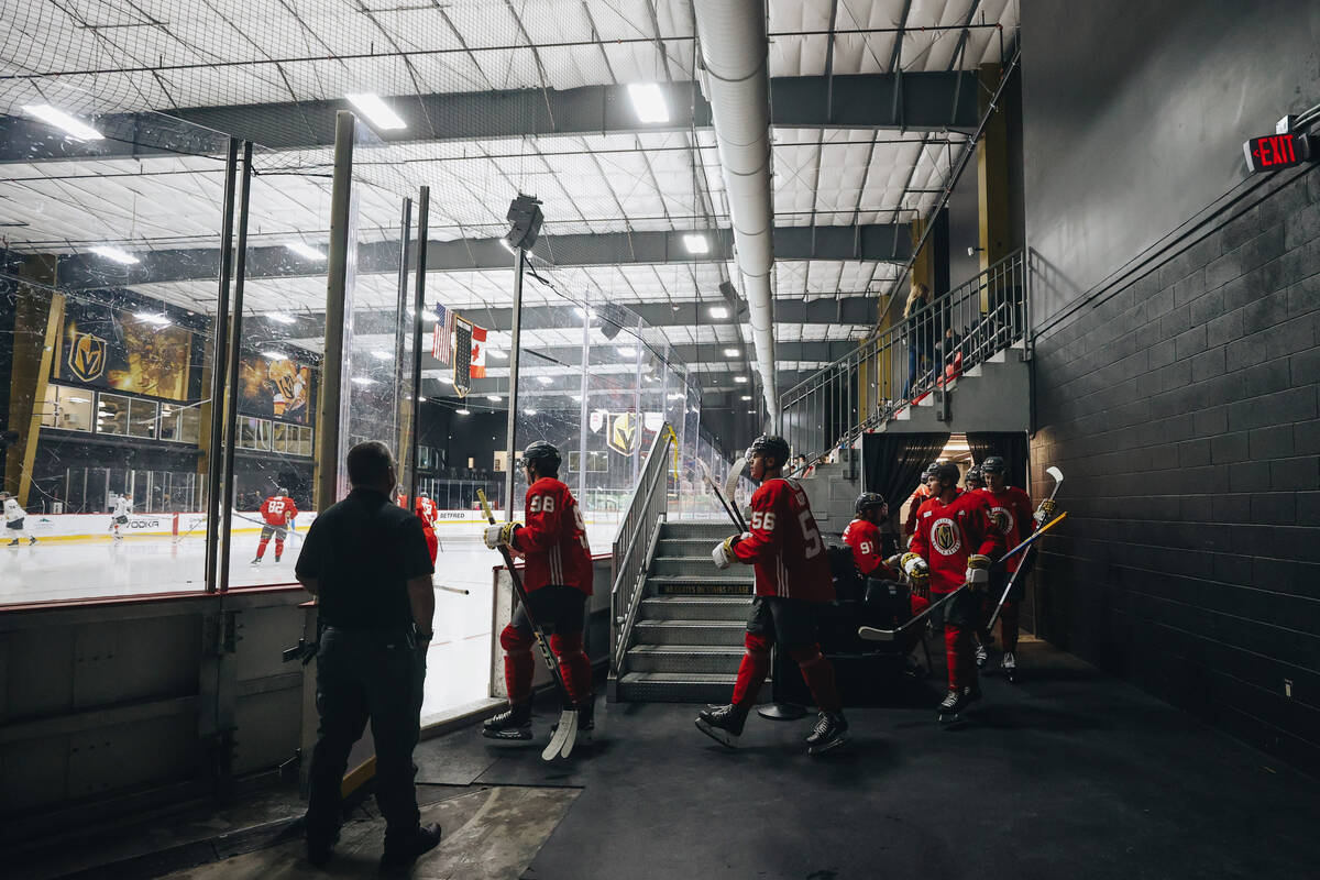 Hockey players make their way onto the ice during a scrimmage on the last day of Golden Knights ...