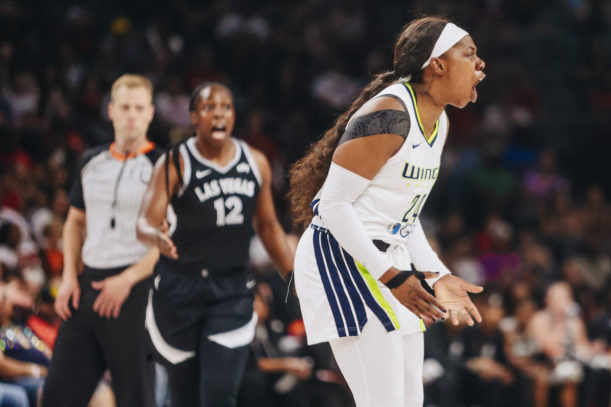 Dallas Wings guard Arike Ogunbowale (24) yells to a referee during a WNBA basketball game betwe ...