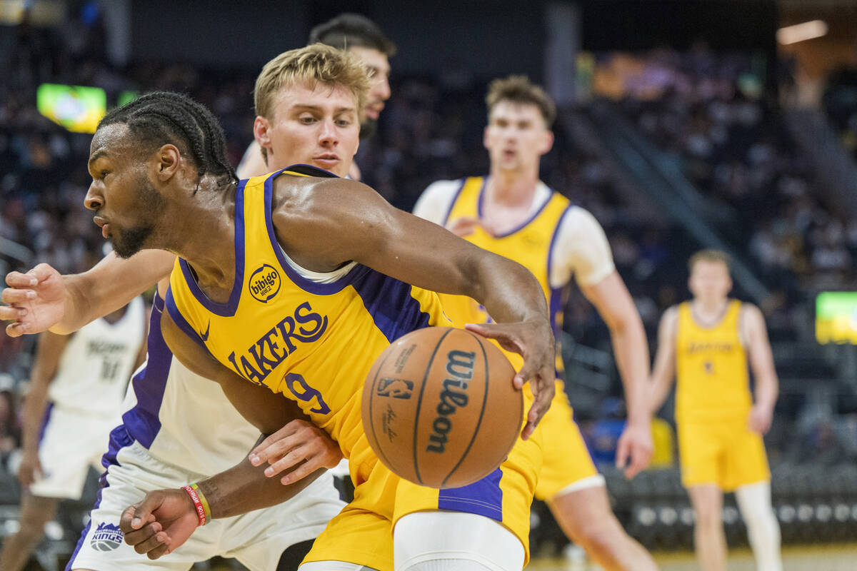 Los Angeles Lakers guard Bronny James (9) drives toward the basket during the second half of an ...