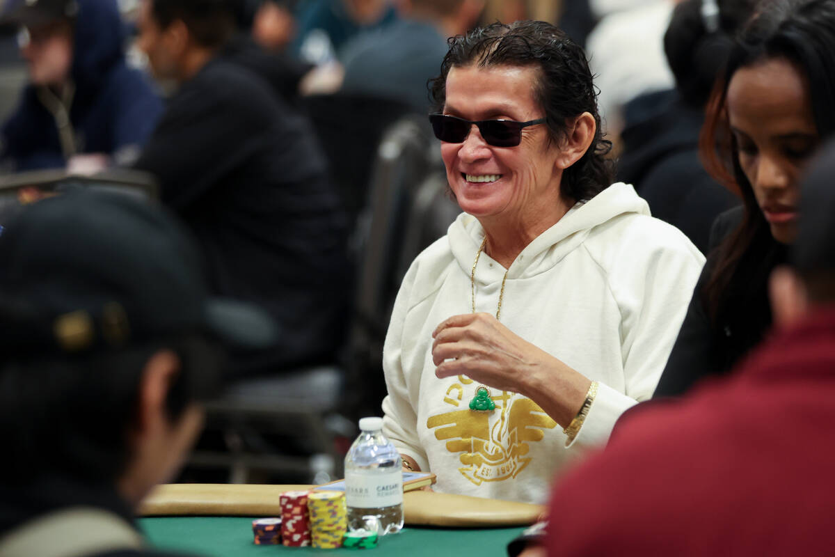 Scotty Nguyen laughs at the table during the World Series of Poker main event at Horseshoe Las ...