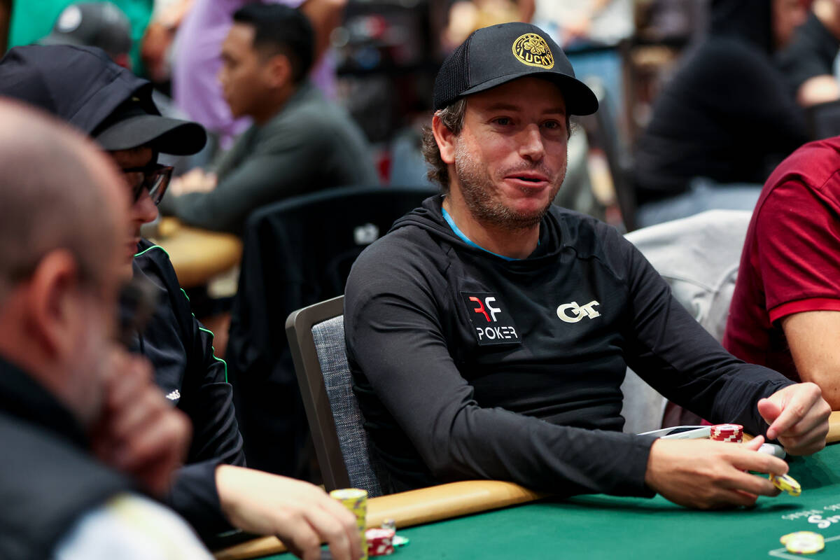 Daniel Weinman chats at the table during the World Series of Poker main event at Paris Las Vega ...