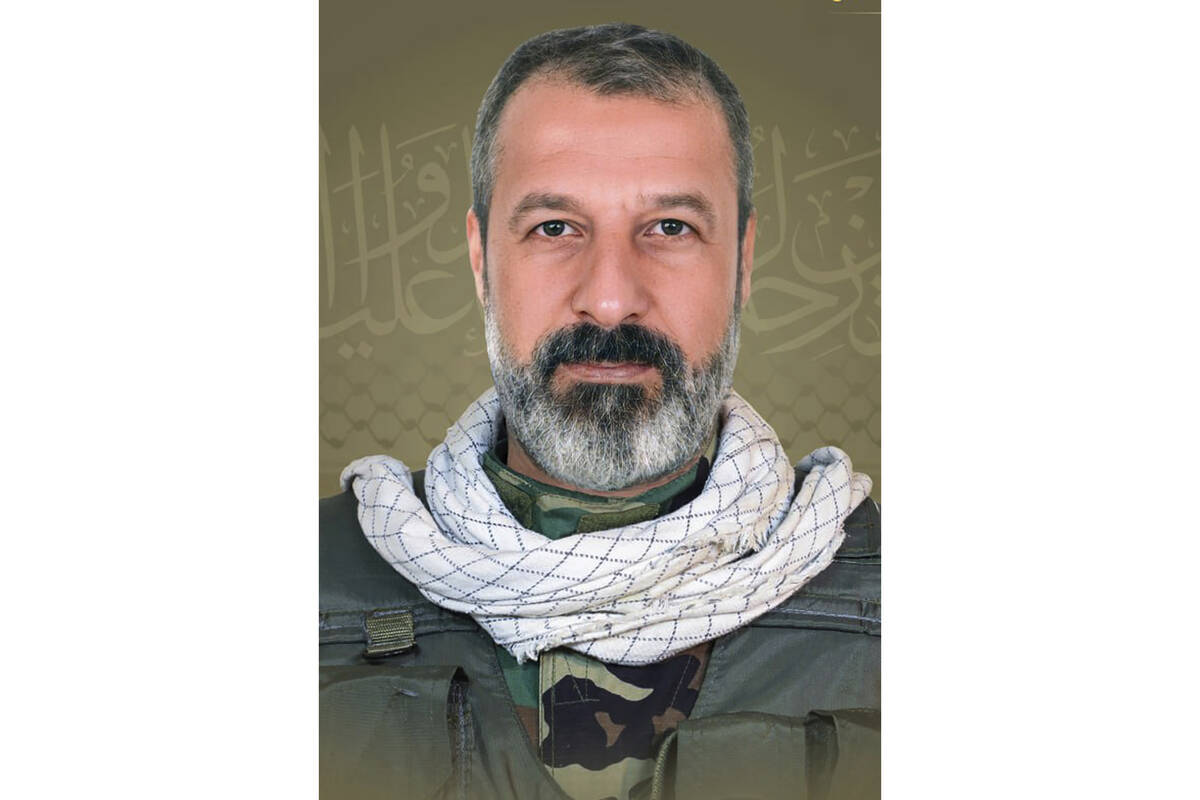 This picture released by Hezbollah media relations office, shows a portrait of Yasser Nemr Qran ...