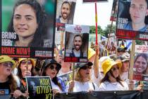 Demonstrators march during a protest by the mothers and relatives of Israelis held hostage by P ...