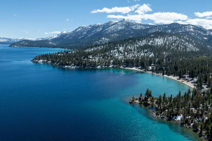 On Monday, caution signs at El Dorado Beach in South Lake Tahoe warned visitors that the harmfu ...