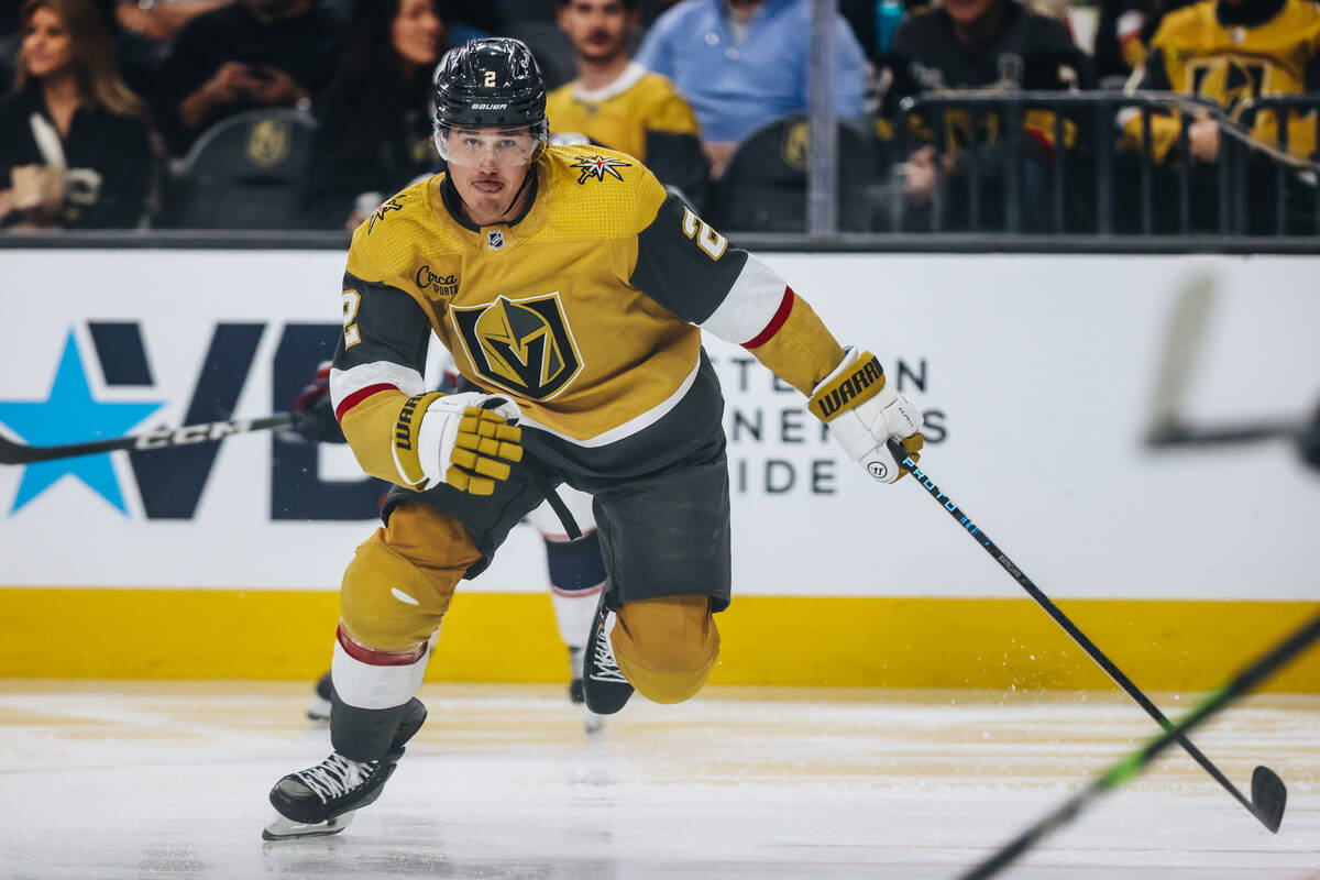 Golden Knights defenseman Zach Whitecloud (2) speeds down the ice during an NHL hockey game bet ...