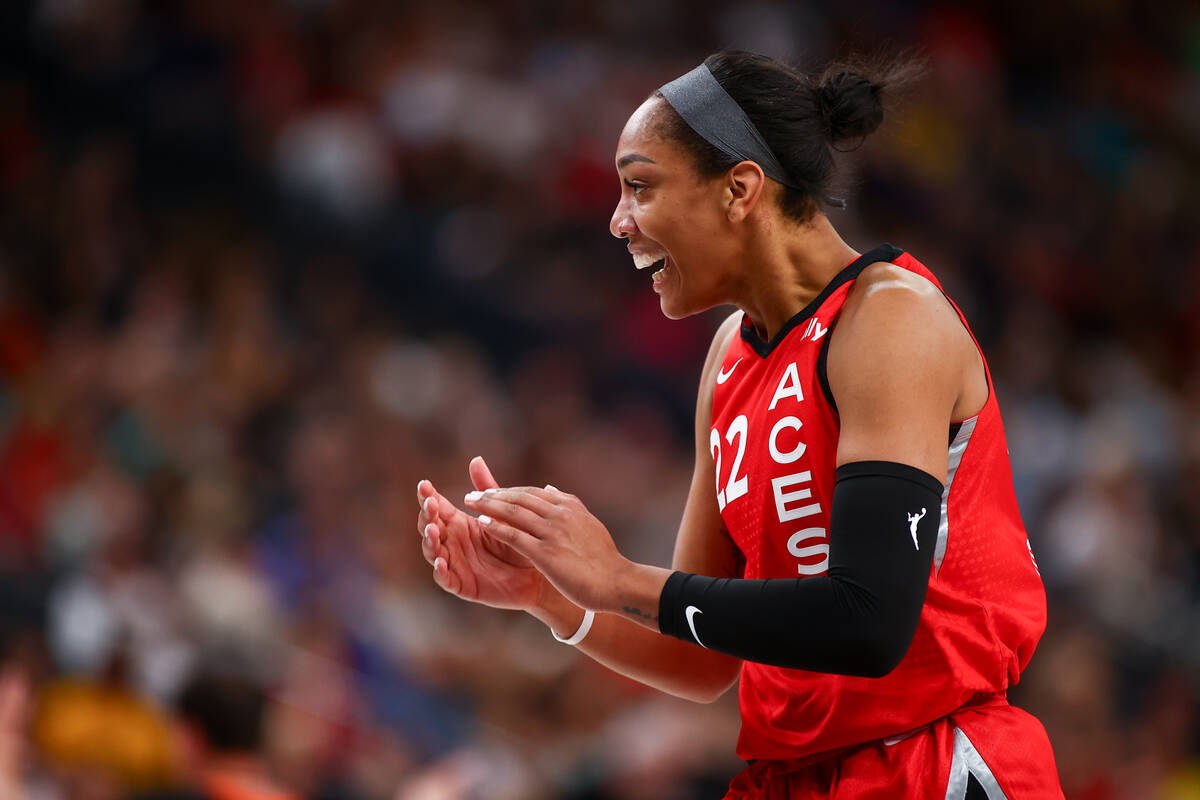 Las Vegas Aces center A'ja Wilson (22) celebrates after scoring during the second half of a WNB ...