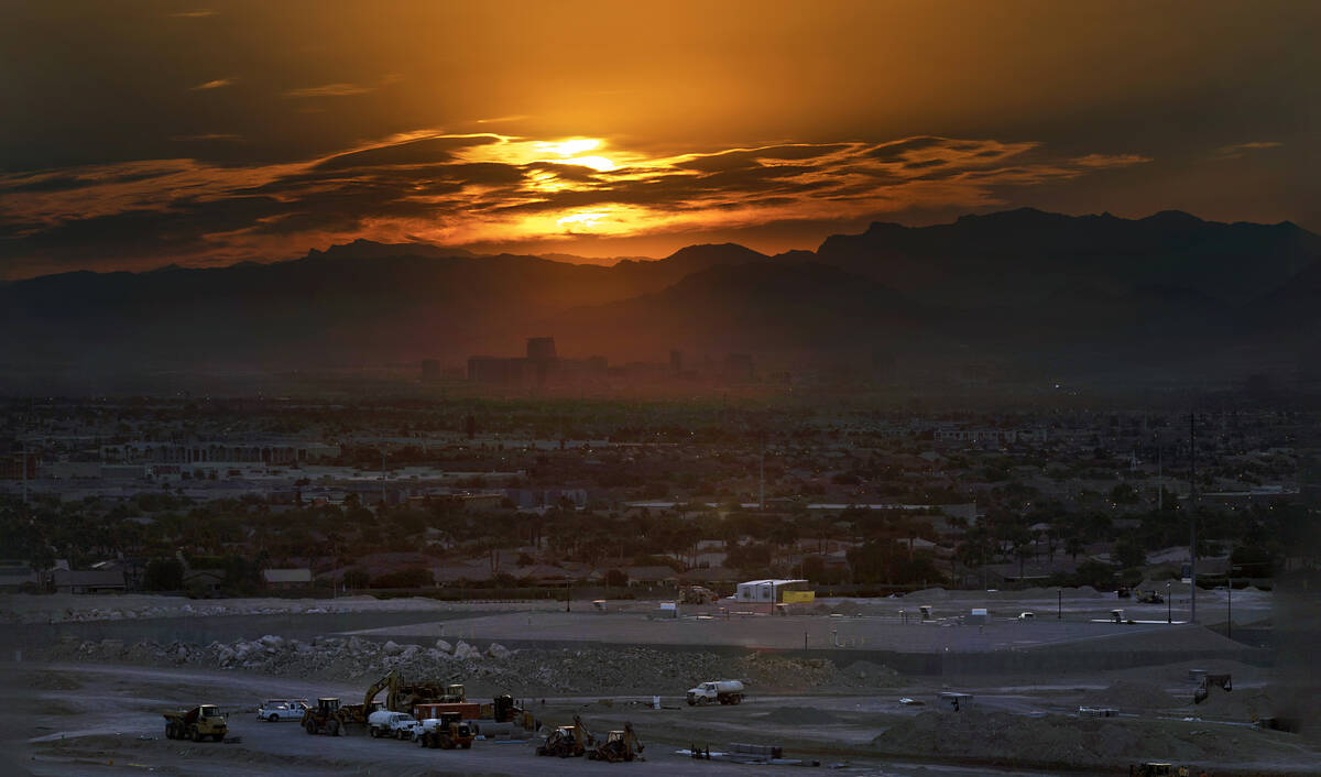The sun rises over the valley and Strip on another high temperature day on Thursday, July 20, 2 ...