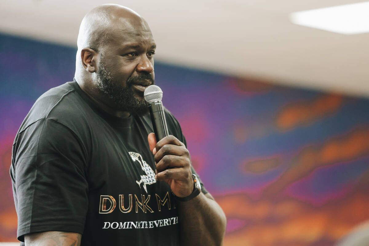 Shaquille O’Neal speaks to a crowd during a press conference at the Shaq-to-School event ...
