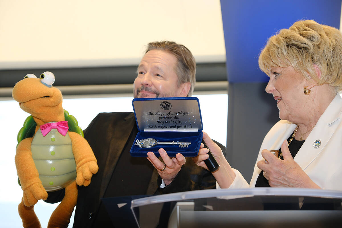 Terry Fator, with Winston the Impesonating Turtle, is shown with Mayor Carolyn Goodman at The S ...