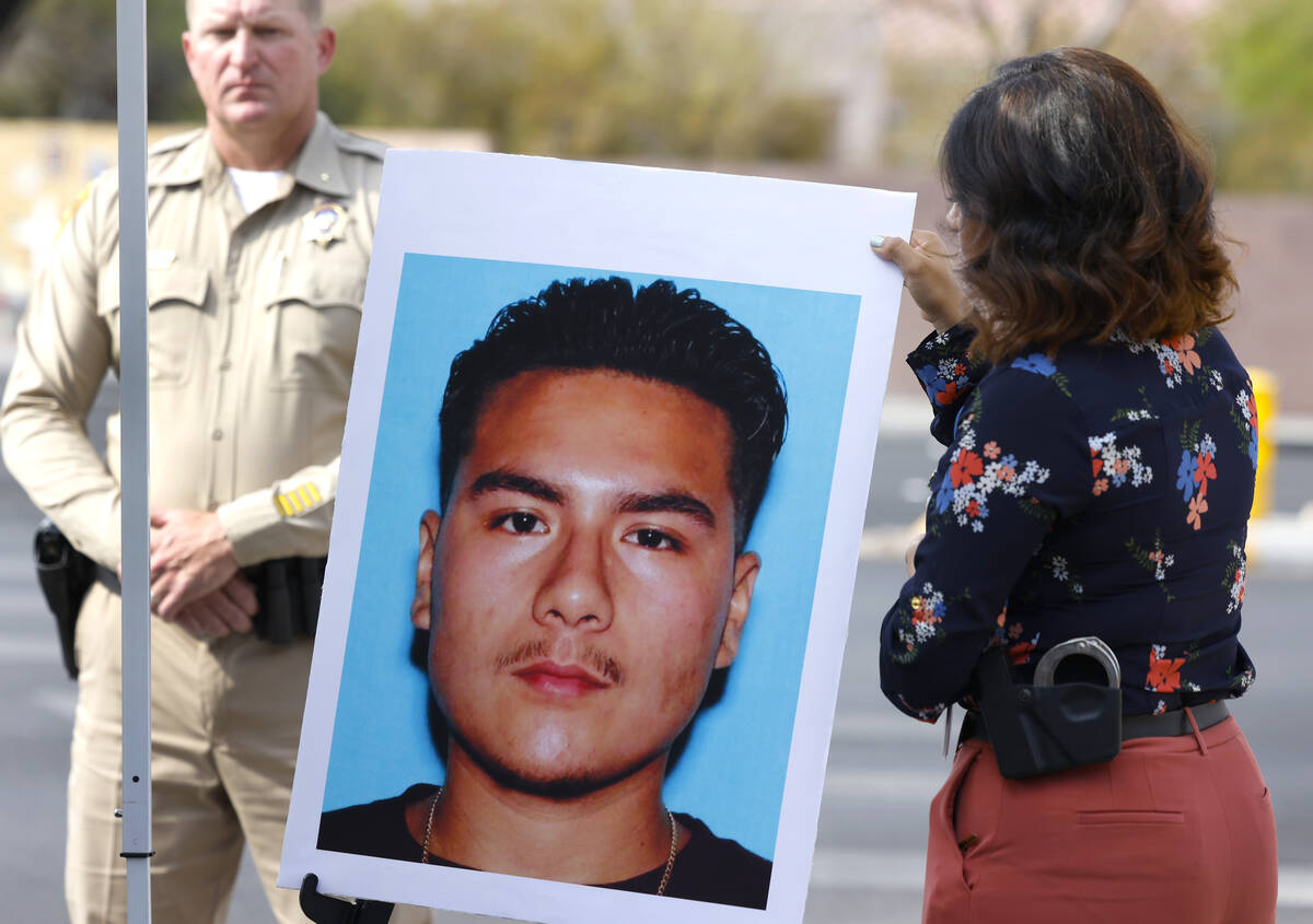 A photograph of Luis Angel Equihua-Murillo, the suspect in hit-and-run crash, is displayed duri ...