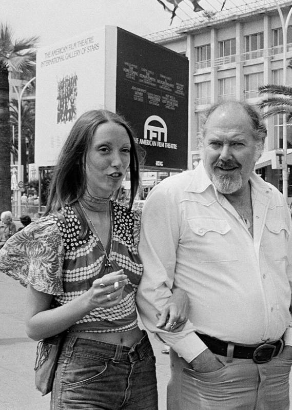 Shelley Duvall, left, and Robert Altman stroll along the Boulevard de la Croisette in Cannes, F ...