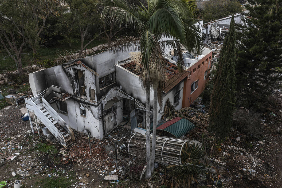 FILE - A battle-scarred home in Kibbutz Be'eri, an Israeli communal farm on the Gaza border, is ...