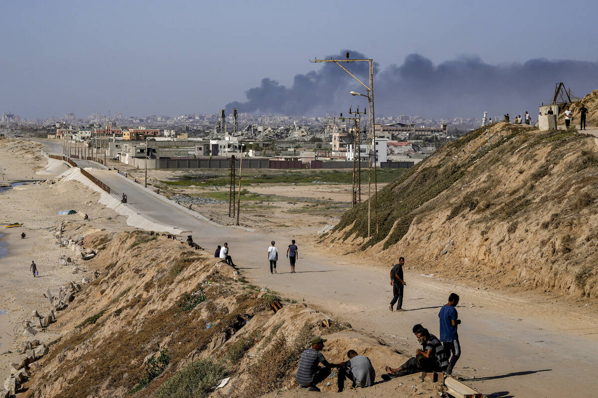 Smoke rises following an Israeli airstrike in the central Gaza Strip, Wednesday, July 10, 2024. ...