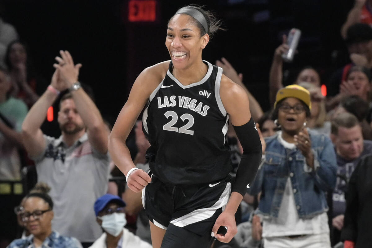 Las Vegas Aces center A'ja Wilson (22) smiles after scorning against the Washington Mystics dur ...