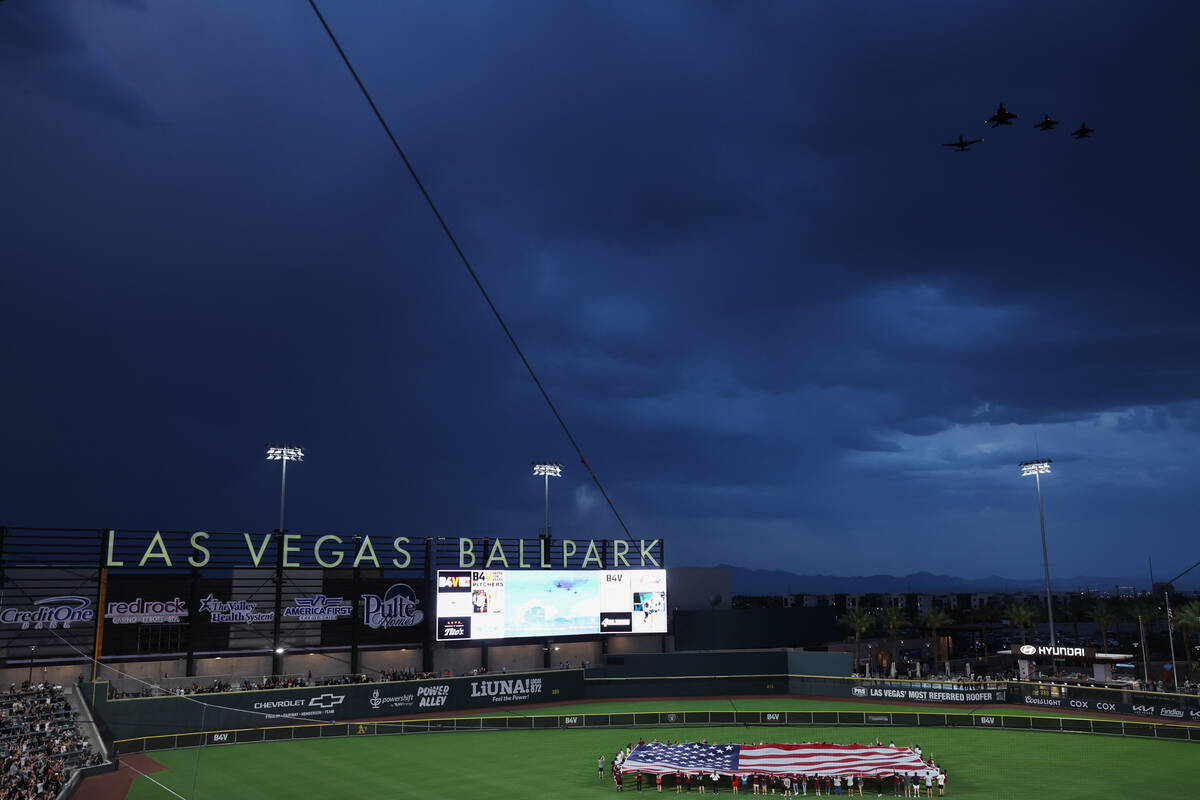 F-35 fighter jets fly over Las Vegas Ballpark during the annual Battle for Vegas charity softba ...
