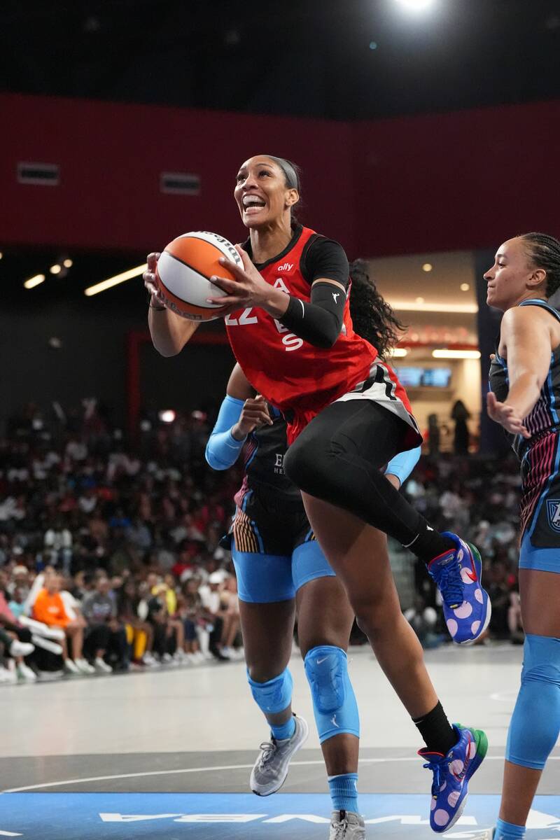 Aces forward A'ja Wilson drives for a layup against the Atlanta Dream on Friday, July 12, 2024, ...