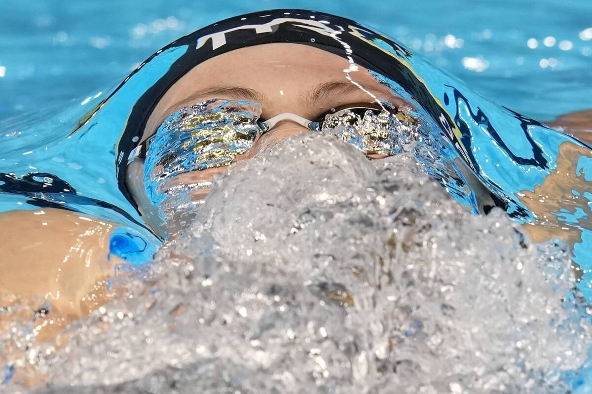 Katie Grimes swims during a Women's 200 backstroke preliminary heat Thursday, June 20, 2024, at ...