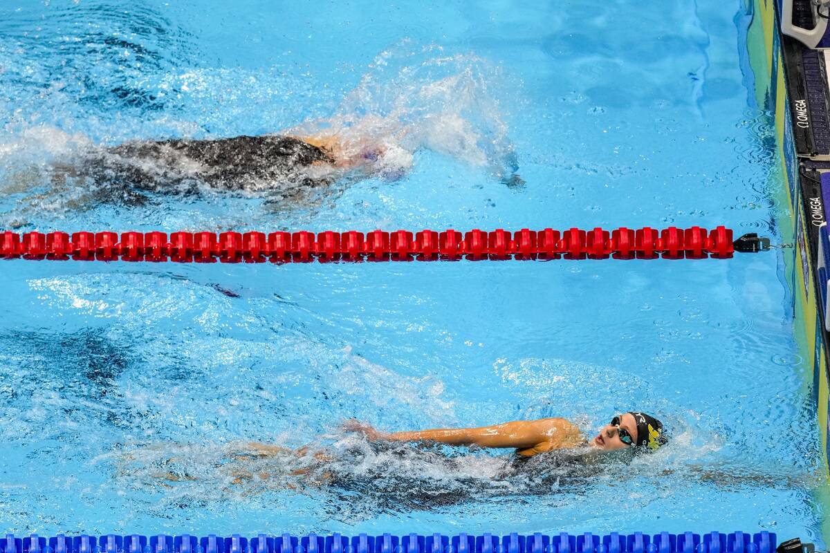 Katie Grimes finishes ahead of Regan Smith during a Women's 200 backstroke preliminary heat Thu ...