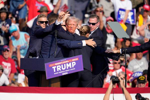 Republican presidential candidate former President Donald Trump is surround by U.S. Secret Serv ...