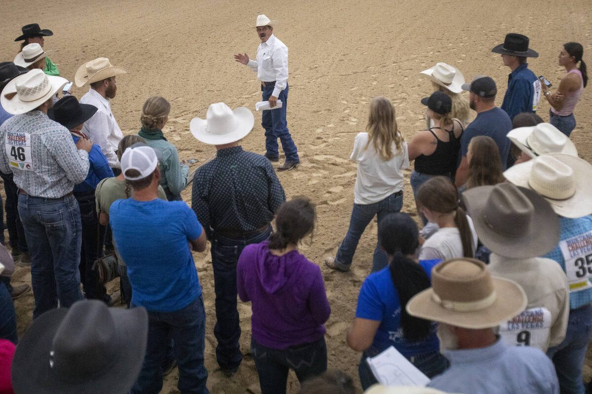 Event Director Stormy Mullins gives final instructions to competitors before the Mustang Challe ...