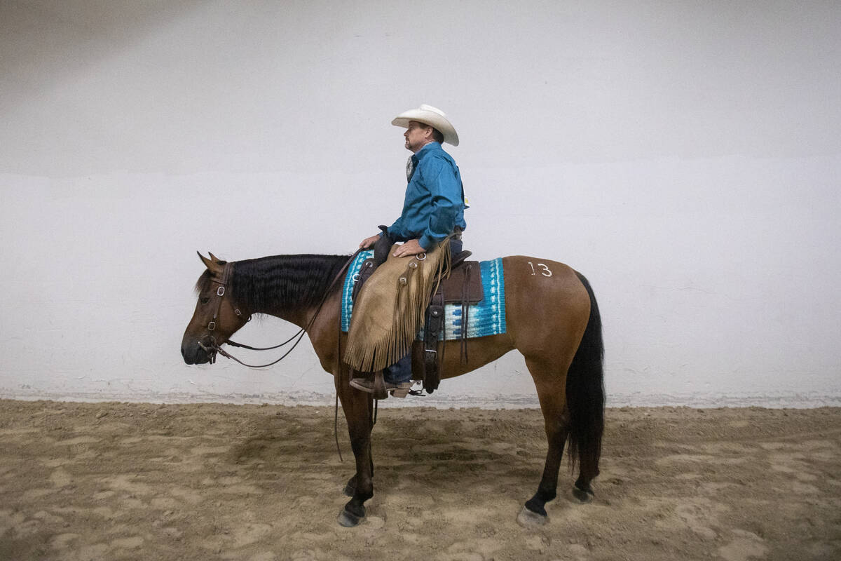 Cavin Graham, of Lafayette, Georgia, watches the competition during the Mustang Challenge at So ...