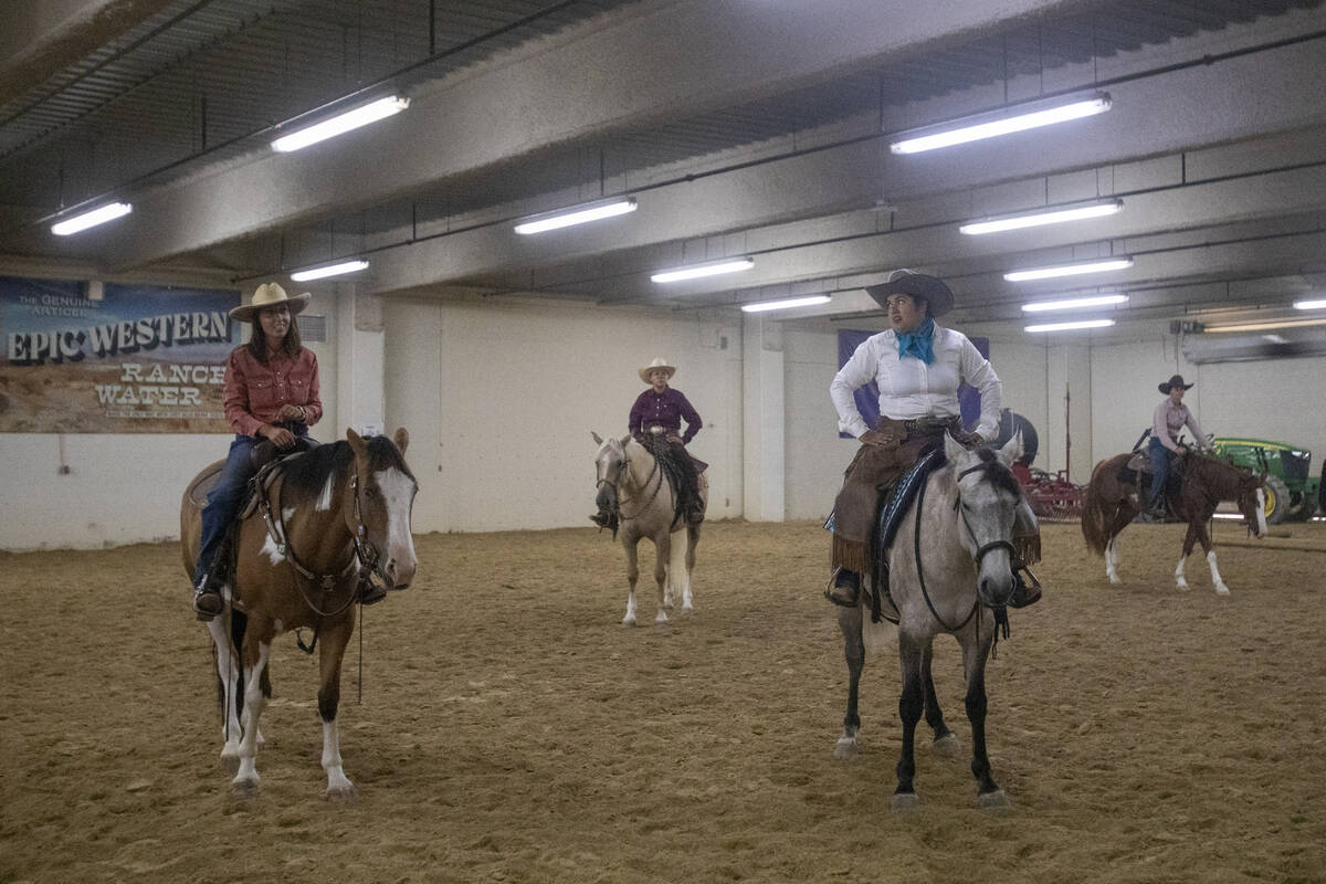 Competitors warm-up and watch a broadcast of the competition during the Mustang Challenge at So ...