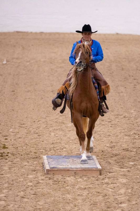 Camille White, of North Zulch, Texas, competes during the Mustang Challenge at South Point Aren ...