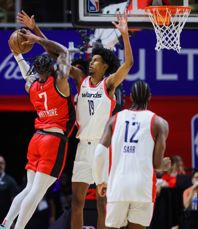 Houston Rockets forward Cam Whitmore (7) dunks the ball as Washington Wizards forward John Butl ...