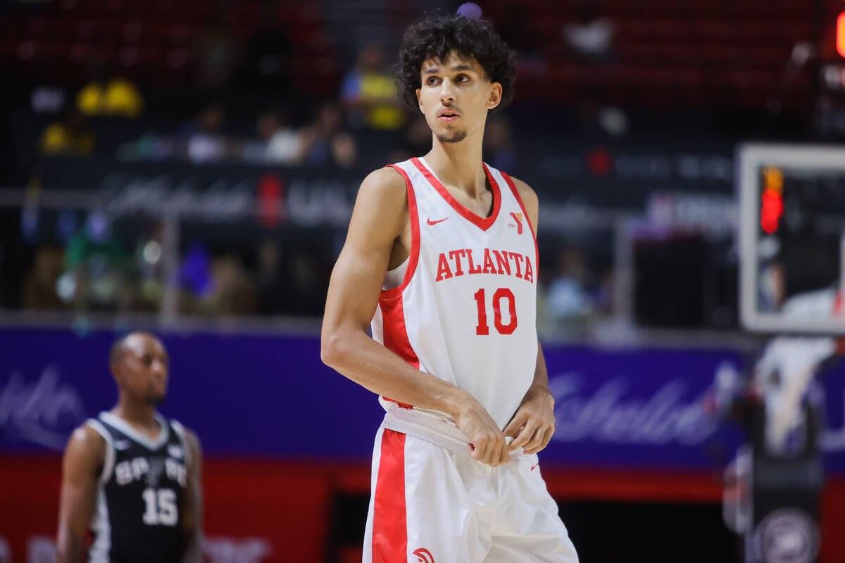 Atlanta Hawks forward Zaccharie Risacher looks to his coach during an NBA Summer League game be ...