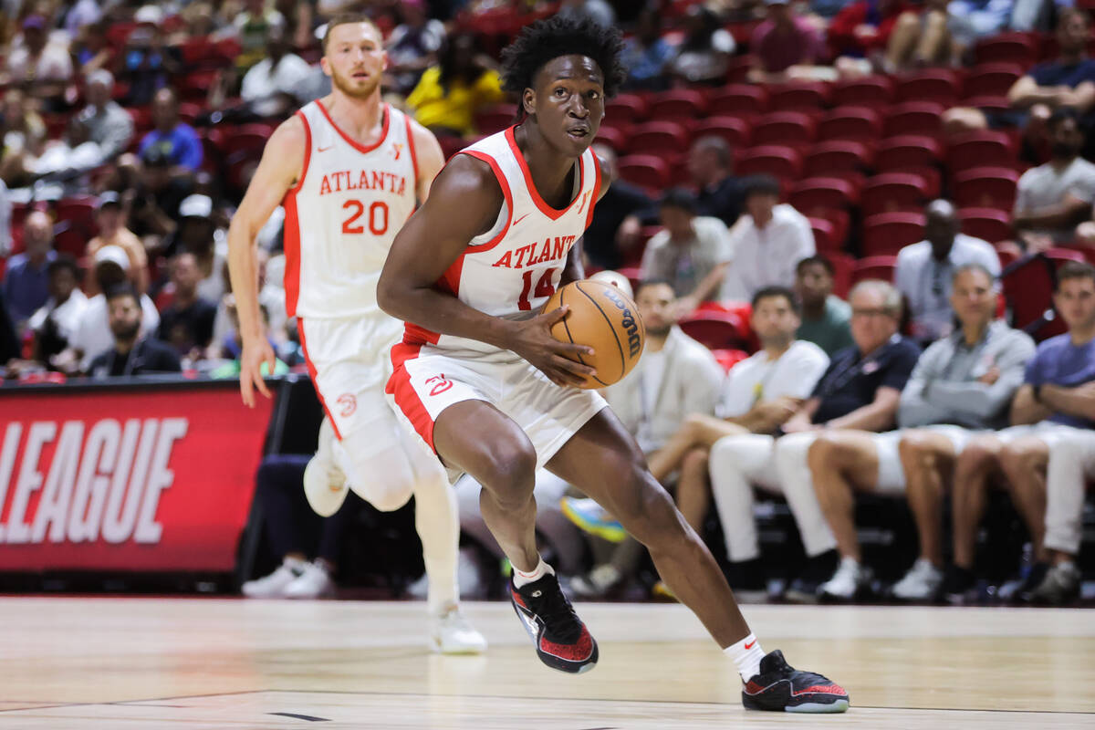 Atlanta Hawks guard Jarkel Joiner (14) drives the ball to the hoop during an NBA Summer League ...