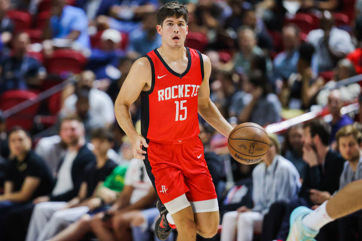 Houston Rockets guard Reed Sheppard (15) dribbles the ball during an NBA Summer League game bet ...