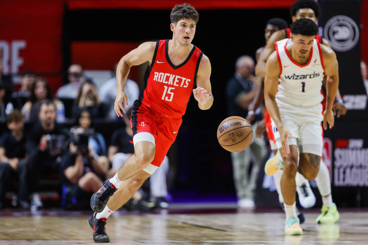 Houston Rockets guard Reed Sheppard (15) dribbles the ball during an NBA Summer League game bet ...