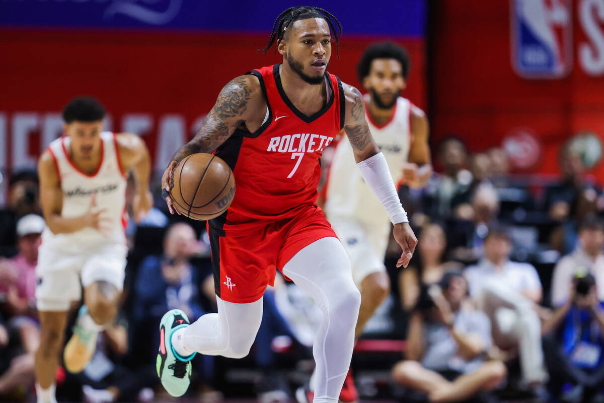 Houston Rockets forward Cam Whitmore (7) dribbles the ball during an NBA Summer League game bet ...