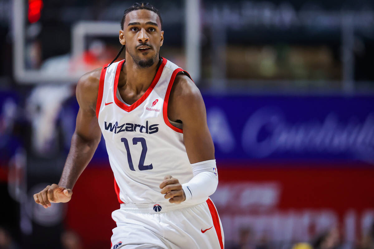 Washington Wizards center Alex Sarr (12) runs down the court during an NBA Summer League game b ...