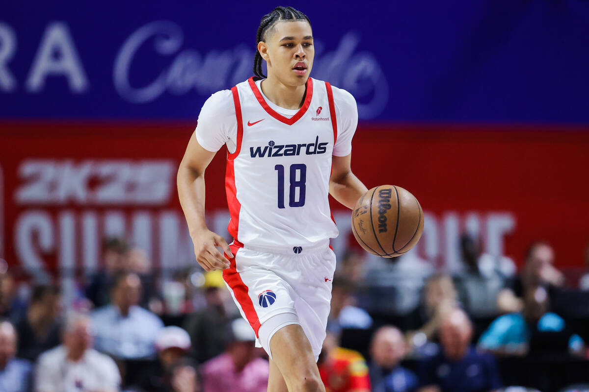 Washington Wizards forward Kyshawn George dribbles the ball during an NBA Summer League game ag ...